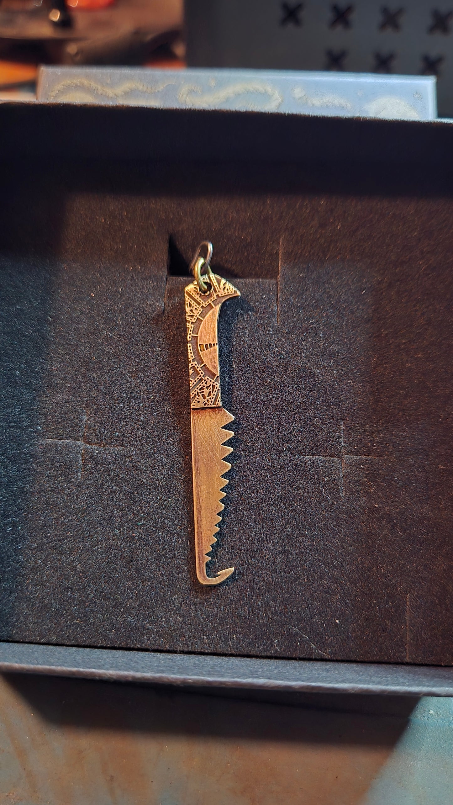 Double-Sided Brass Female Cenobite Hooked Saw Pendant